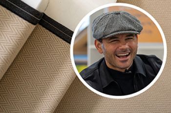 Neutral herringbone wool carpet stair runner with black edging